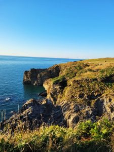 rugged cliffs and blue sea