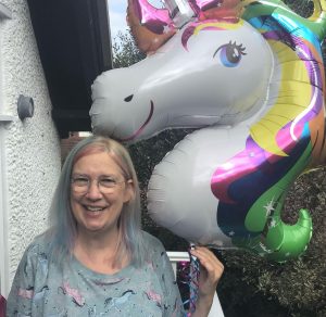 Nikki Green with inflatable unicorn